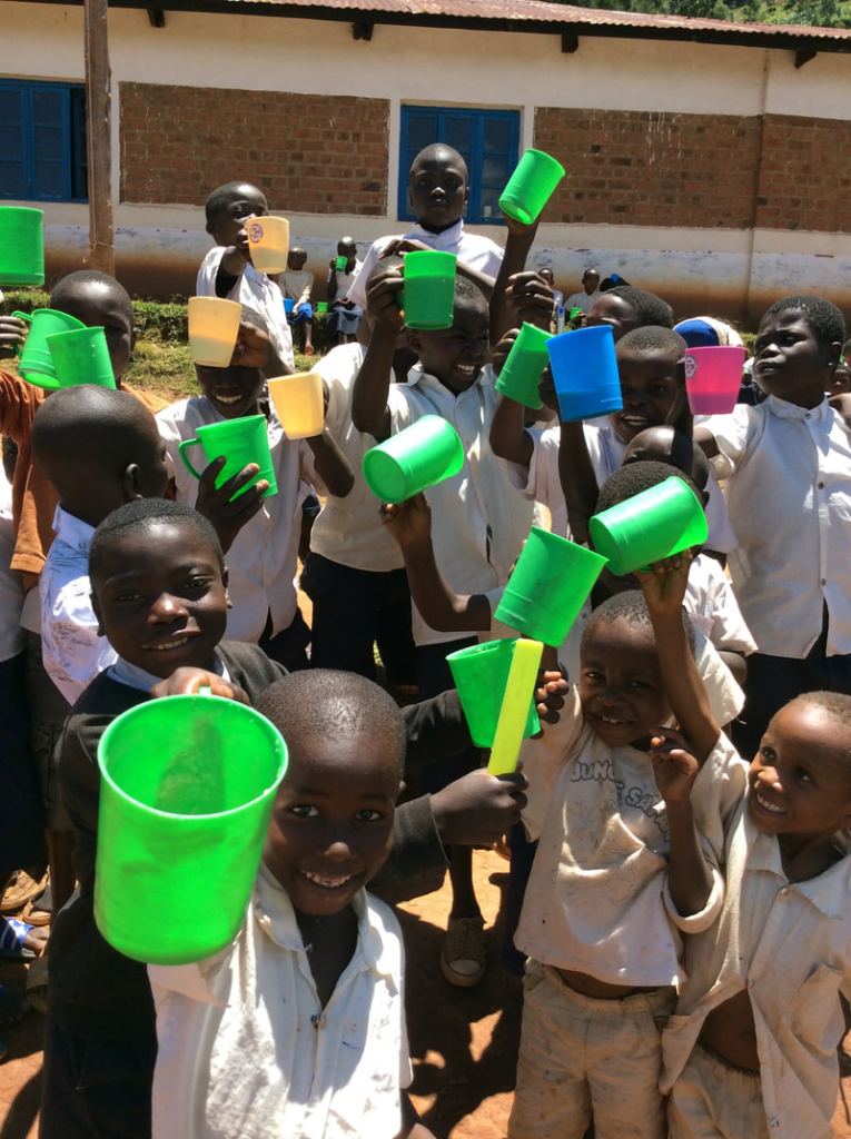 Orphans gather to receive a meal at Redeeming Love Ministries' feeding center.